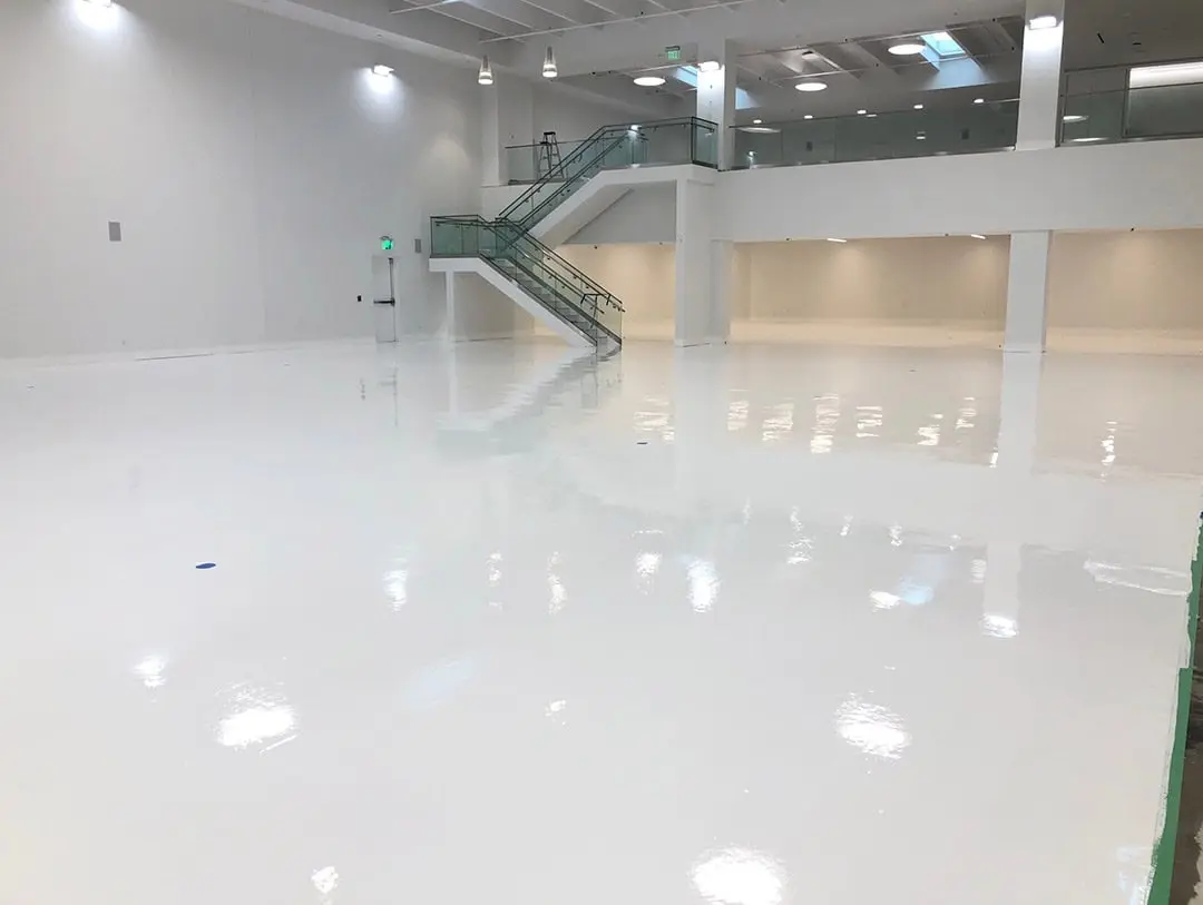 Large government facility with polished epoxy flooring and industrial equipment