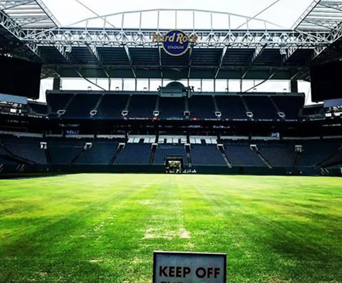 High-gloss amber stained concrete floor in a retail bike shop showroom