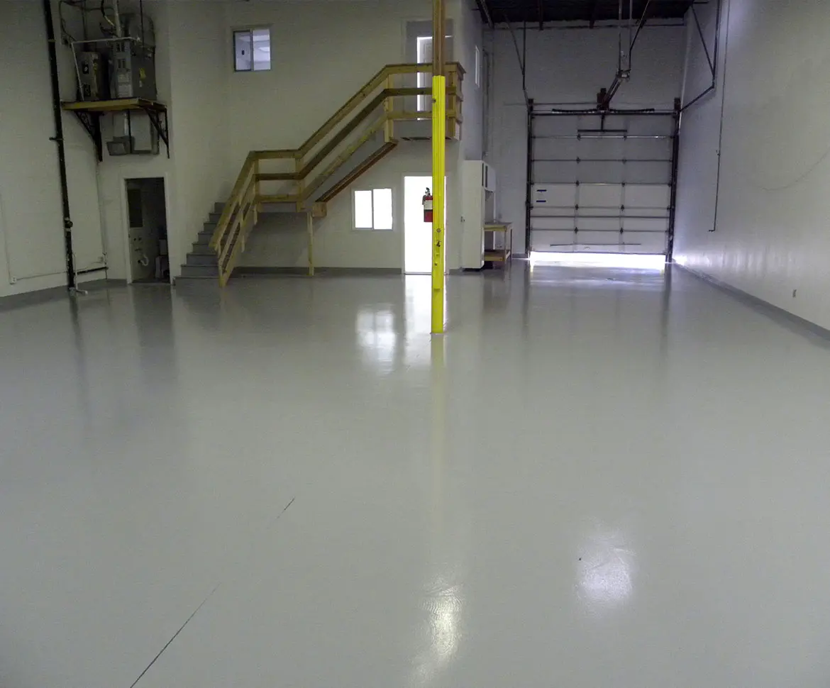 Warehouse floor with heavy-duty chemical-resistant epoxy coating